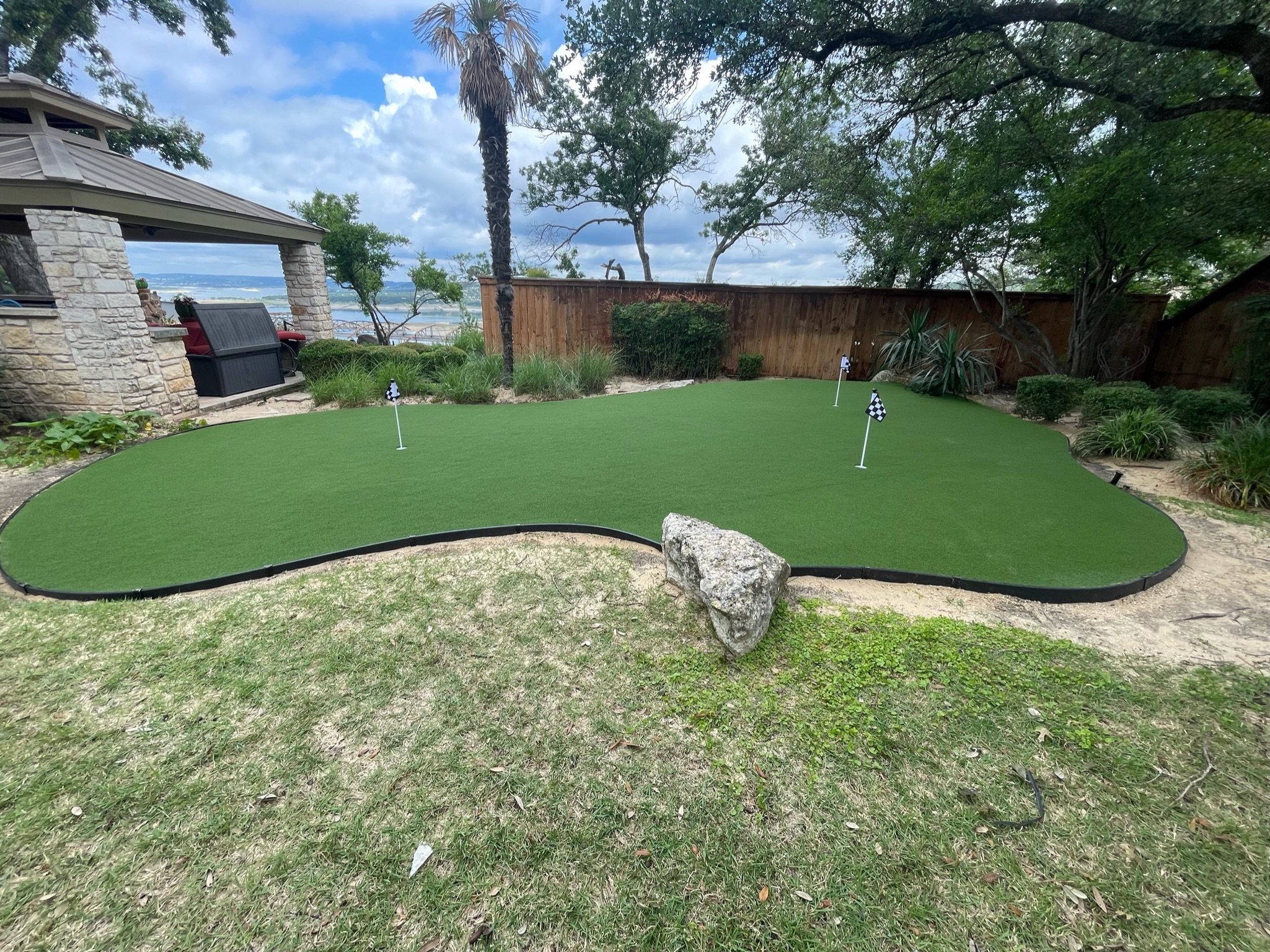 At home, custom artificial turf putting greens